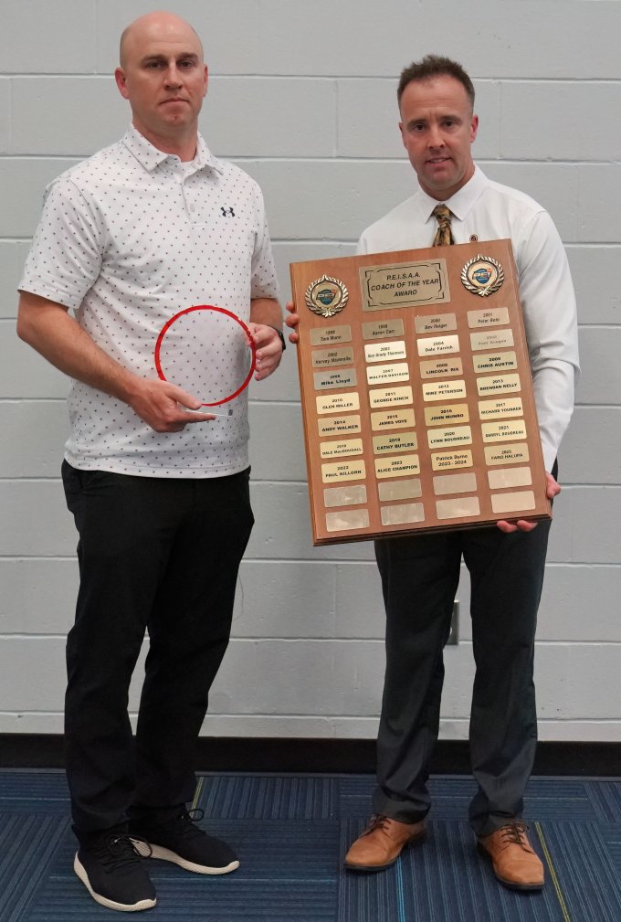 Presenting Award to Faro Halupa is TOSH AD and PEISAA Chair Joel Arsenault.