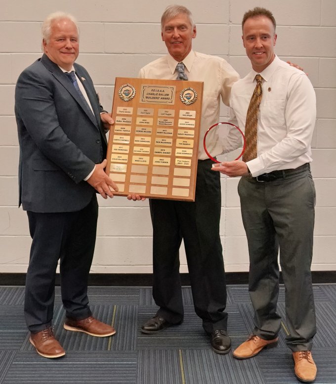Presenting Award MLA Hilton MacLennan and Chair of the PEISAA Joel Arsenault